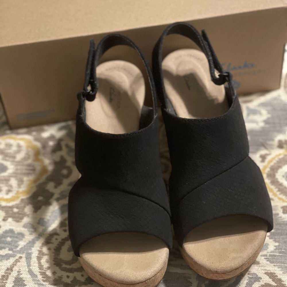 Clarks Black and Tan Wedge Sandals with Slingback Design